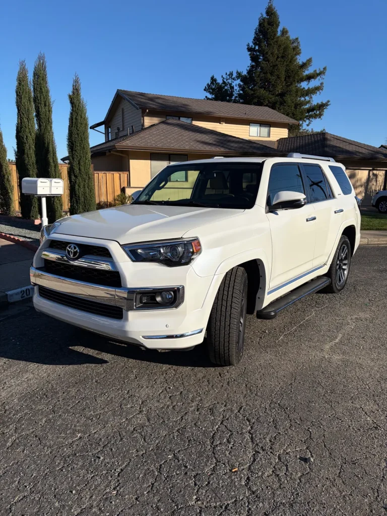 a white Toyota 4Runner SUV